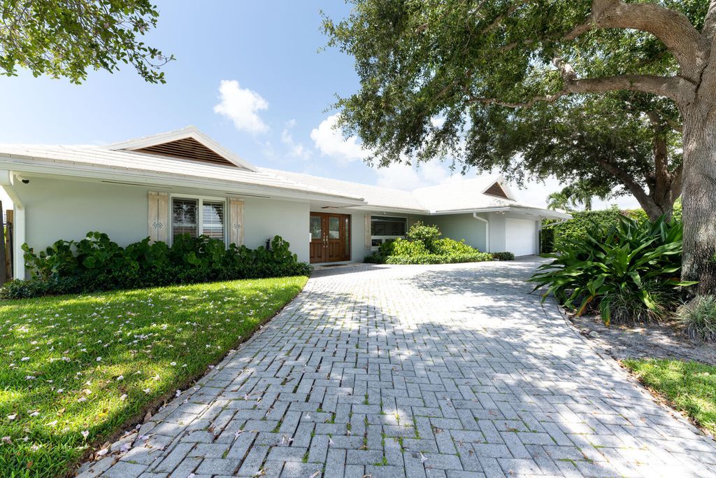 Photo of 412 Oyster Road Rd, North Palm Beach, FL 33408 (MLS # R10816081)