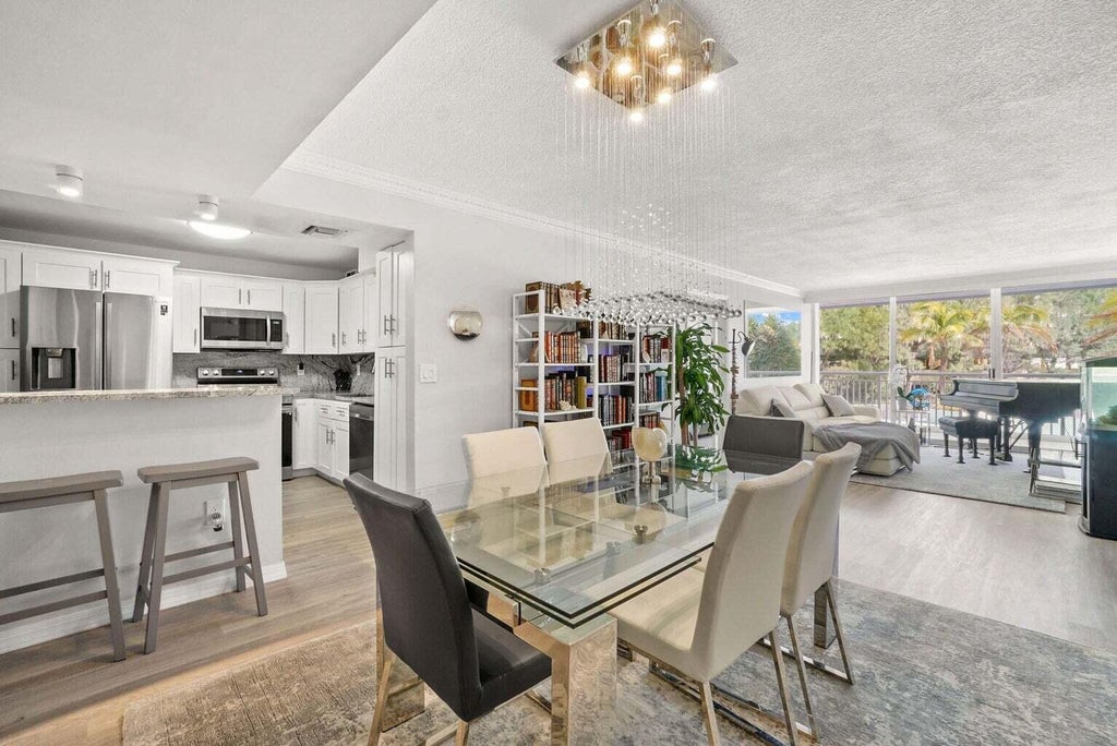Photo of 3546 S Ocean Boulevard #322, South Palm Beach, FL 33480 (MLS # B26066626)