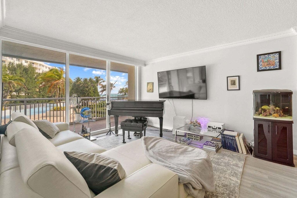 Photo of 3546 S Ocean Boulevard #322, South Palm Beach, FL 33480 (MLS # B26066626)