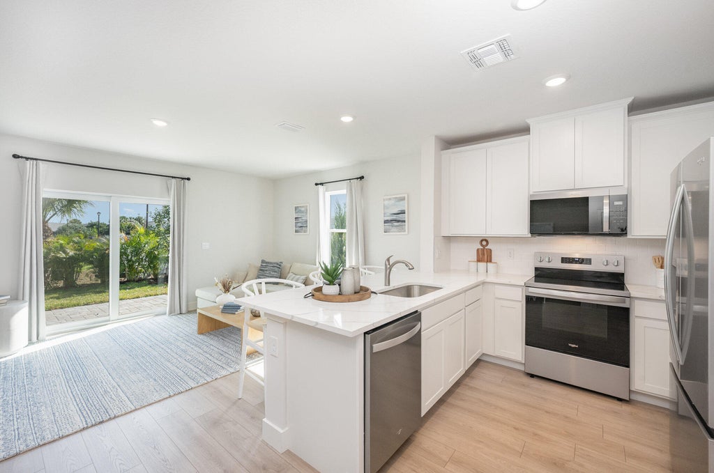 Photo of 8159 COBBLESTONE Drive, Fort Pierce, FL 34945 (MLS # B26070377)