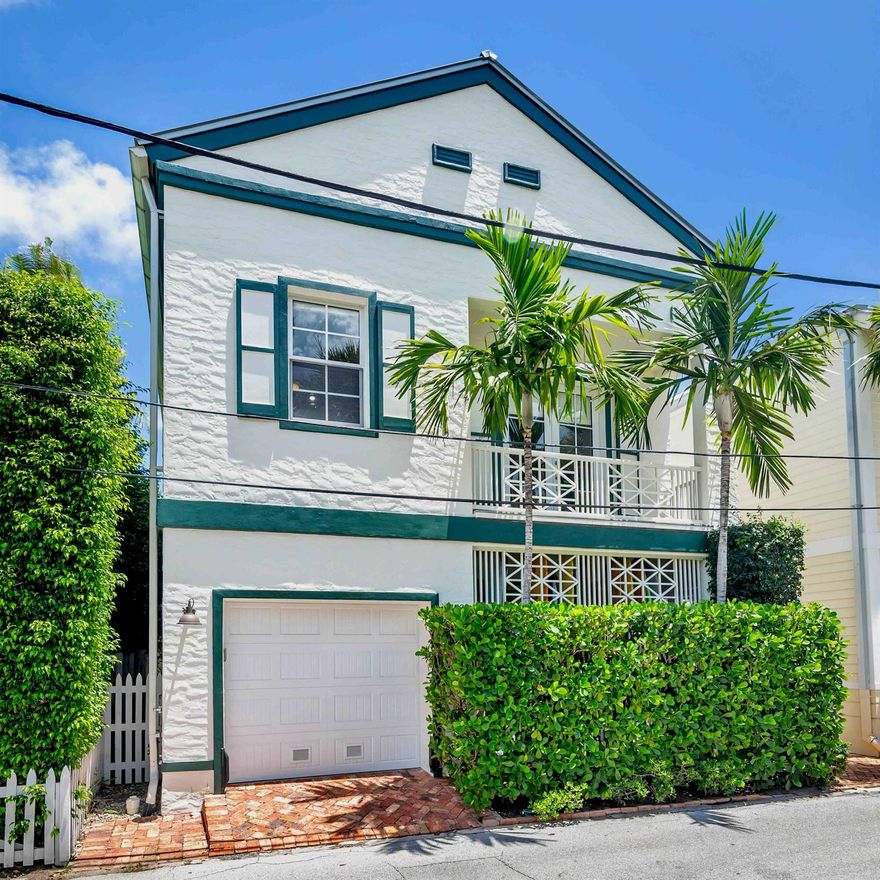 Tremendous opportunity to own an ocean block beach house on historic Root Trail in Palm Beach. This beautiful home offers 2 bedrooms, 2.5 baths, and a 1-car garage. Located just minutes from the beach, retail, and restaurants, it features a large family room, hardwood floors, and full impact glass windows. The second-floor boasts a balcony, perfect for enjoying the coastal breeze. Don't miss out on this exceptional property in a prime location.