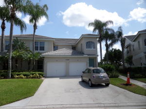 1st floor condo on an amazing corner location in the Village of Andover at Wycliffe Golf and Country Club with rolling golf course and lake views. Thisneutral painted great room style home with high volume ceilings and track lighting has three true bedrooms with large closets, two bathrooms plus 1 car garage. New A/C and W/D installed in 2013 as well as updated microwave in the kitchen, and wood floors in bedrooms. Master Suite has two walk-in closets and a linen closet with sliding glass doors to the covered screened enclosed patio. Master bathroom has his and her sinks with vanity as well as a roman tub and Jacuzzi with separate shower. Covered and screened tiled patio for enjoying the view and entertaining.