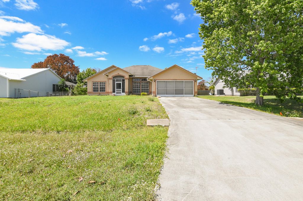 Photo of 1810 SW Mcallister Lane, Port Saint Lucie, FL 34953 (MLS # B26016700)