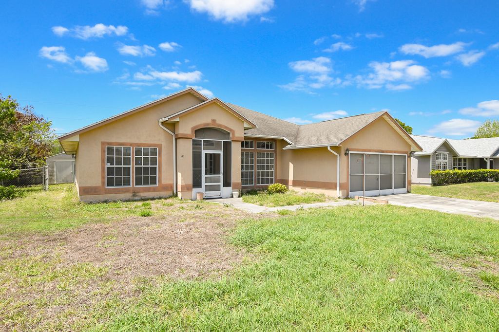 Photo of 1810 SW Mcallister Lane, Port Saint Lucie, FL 34953 (MLS # B26016700)