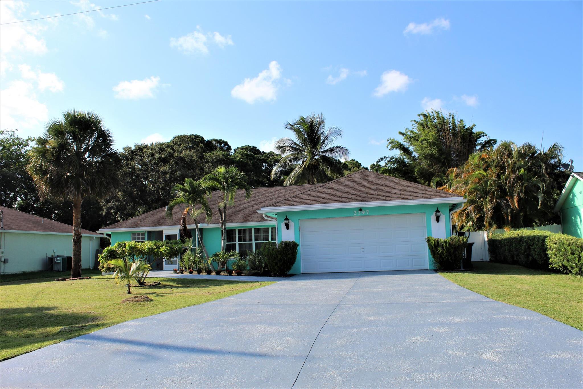 Beautiful house, just minutes from the beach, walmart, Jensen Beach Mall and many other major stores. The kitchen features nice cabinets, granite counter top, large pantry and beautiful tile through out the houde. The house also has a nice fenced backyard with a mature mango tree.