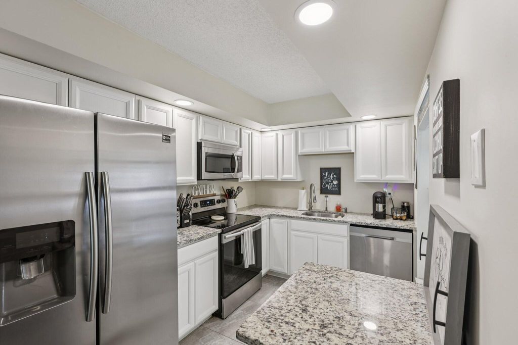 Photo of 301 Olivewood Place #Unit 0130, Boca Raton, FL 33431 (MLS # B26004340)