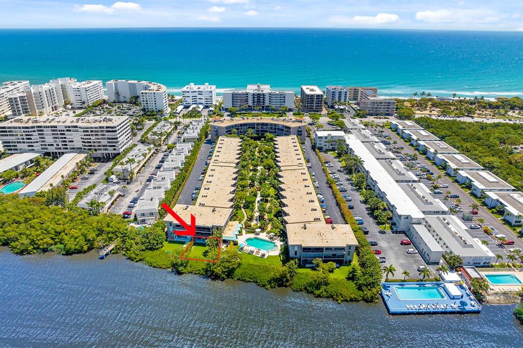 WATERFRONT, fully-renovated 2 bedroom condo with PRIVATE backyard on the Intracoastal (limited common area). Enjoy waterfront view from the condo or walk across the street to the private ocean access beach! Bright new kitchen with open concept dining & living room, great for relaxing or entertaining. This 2-bed 2.5-bath home flaunts an enormous master bedroom with its own bathroom, walk-in closet & laundry room. Keep your guests happy with their own full bathroom & walk-in closet. Impact Hurricane Windows.Only a few steps to the heated pool on the Intracoastal. Assigned parking near the unit at the end of covered walkway. BBQ area, doorman, on-site manager & guest parking. Only 20 minutes to to the Palm Beach airport, close to shops & the Old Key Lime House restaurant. Sorry NO Pet