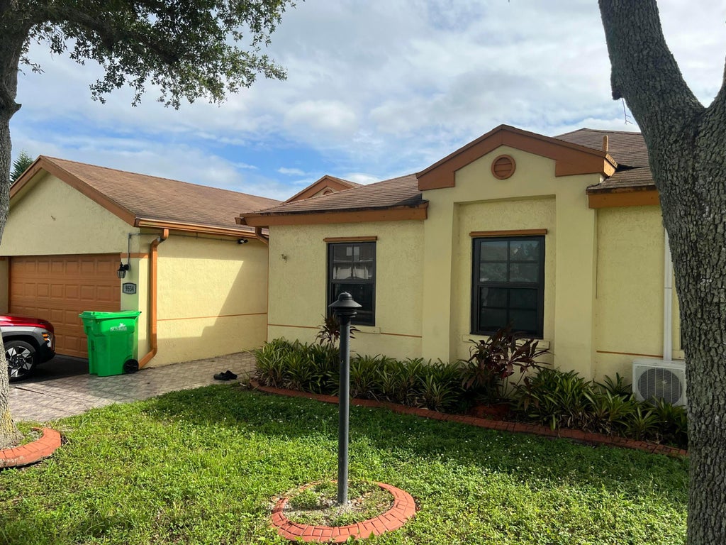 Photo of 9534 NW 52ND Manor, Sunrise, FL 33351 (MLS # B26091303)