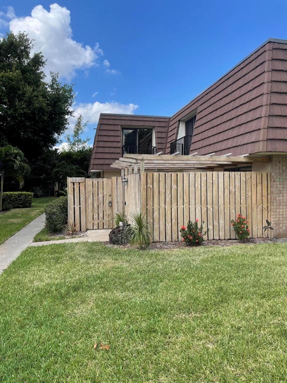 Located in a quiet section of garden lakes is 2017 20th Lane, a well maintained, recently updated 2 bedroom, 2.5 bathroom townhouse. The main floor has modern laminate wood planks, an open kitchen with stainless steel appliances, quartz countertops, and white shaker cabinets. Upstairs you will find 2 bedrooms and 2 full bathrooms. Both bathrooms have been updated. The hot water heater was replaced in 2021 and the roof in 2018. The entire home is freshly painted including removal of the popcorn ceilings. Low HOA fee which includes master insurance policy at $175 per month. Close to shopping, 95, and the turnpike. Schedule a showing today.
