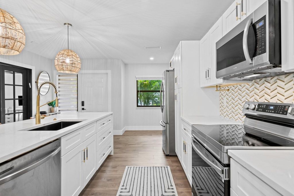 Photo of 3701 Arelia Drive, Delray Beach, FL 33445 (MLS # F10534498)