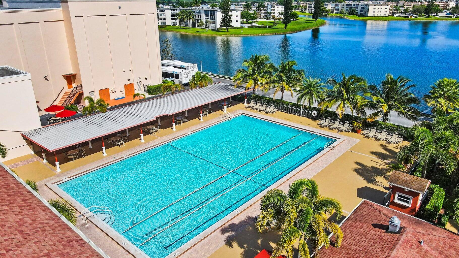 Spacious lovely 2 bedroom 2 bath with Lake views Ready to rent annually or seasonal. Fabulous Club house indoors pools. Tennis, PICKLEBALL, full equipped gym. Tenant only pays electric includes cable - HBO internet-water. FABULOUS CLUB HOUSE Over 100,000 sq ft, Theater with many shows. Free movies. Close to shopping, Super market, free bus service. 55 and over community.