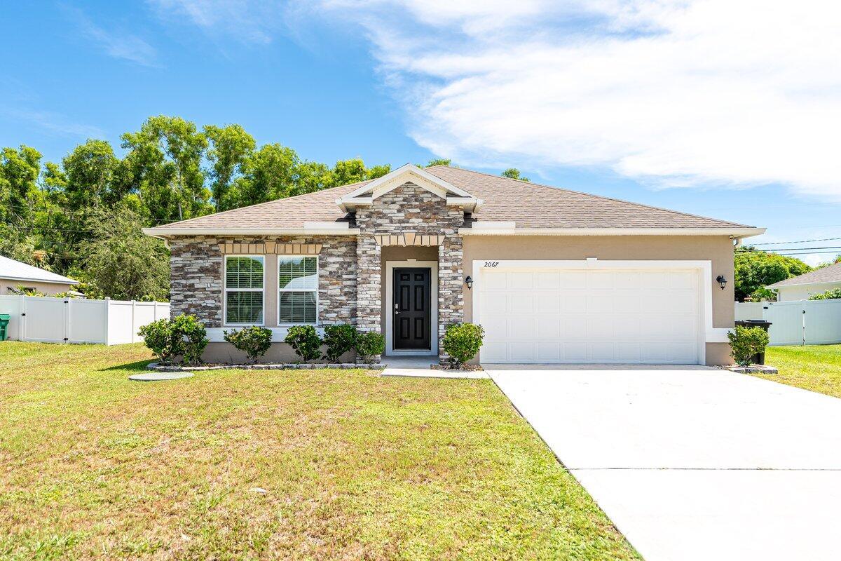 Immaculate 4-Bedroom, 2-Bath Home with Pool in Prime Location - This well-built 2015 Maronda home offers spacious living and is perfect for both relaxation and entertaining. Featuring a private screened-in lanai with a heated pool and ample outdoor lounging space, it's an entertainer's dream. Inside, the open floor plan includes a front living room, a large kitchen with expansive granite countertops, a coffee bar, and a separate pantry. The kitchen seamlessly flows into the dining and family areas, ideal for gatherings. The generous primary suite boasts a luxurious en-suite bath with a spa-like tub, separate shower, double sinks, and a large walk-in closet. Additional highlights include volume ceilings, tile flooring throughout the main living areas, carpet in the bedrooms,