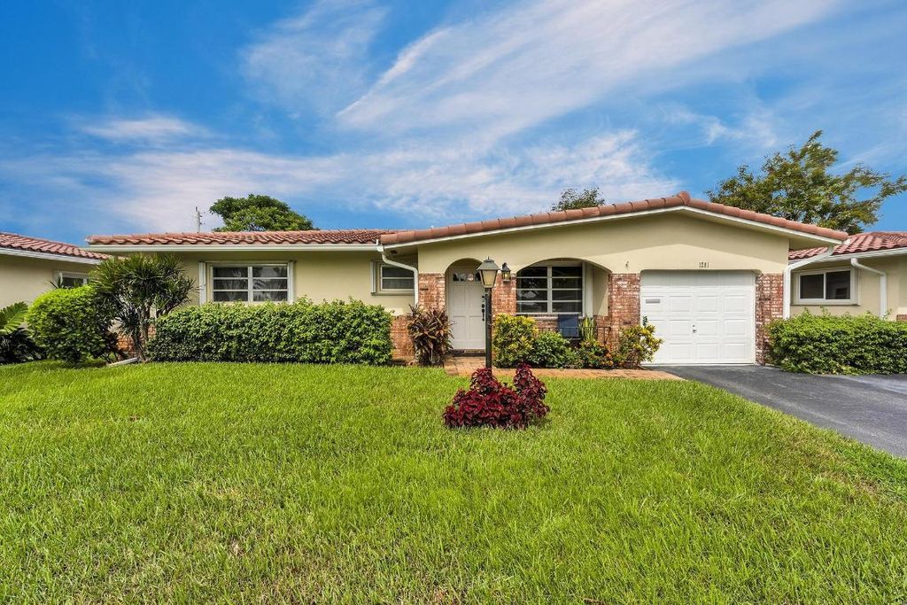 Photo of 1261 NW 44th Street, Deerfield Beach, FL 33064 (MLS # R11099926)