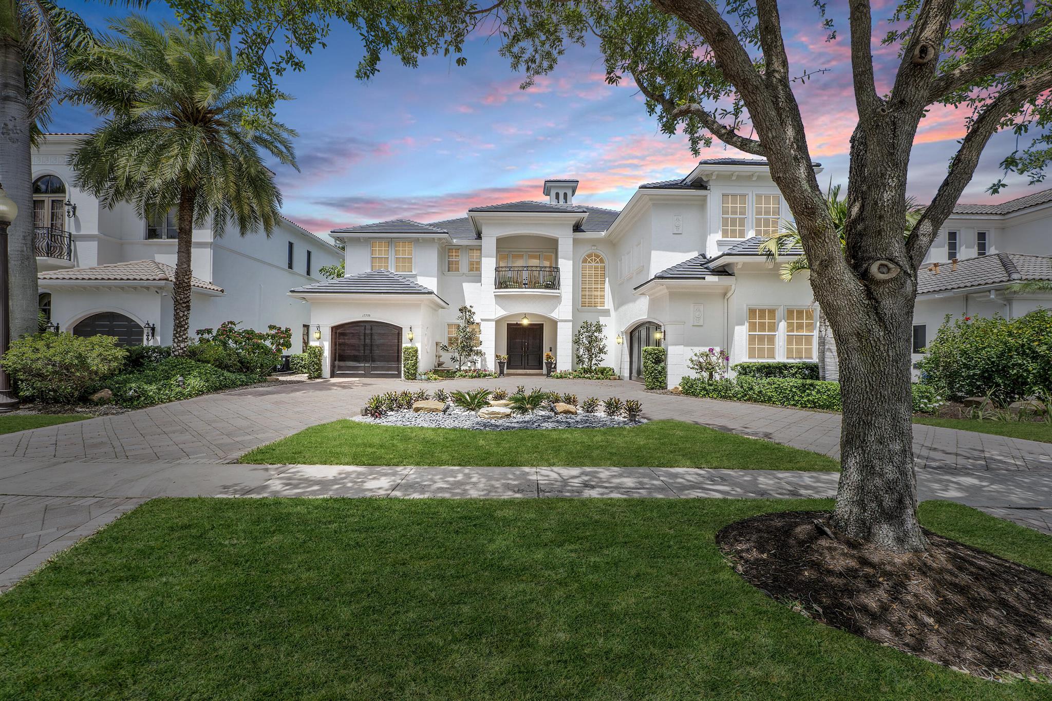 Indulge in the epitome of Luxury Living with this SPECTACULAR one-of-a-kind Custom Estate Pool Home with BRAND NEW ROOF nestled within the prestigious community of The Oaks at Boca Raton. Designed to impress, this magnificent home seamlessly blends elegance with functionality, offering 5 Bedrooms, Office, Spacious Loft, Theater Room and Flex Room with 4.2 Baths. Upon arrival, the Grandeur of the home is immediately apparent, with its large circular driveway, New Roof in Saxony Slate Dark Charcoal completed 4/24 and Modern NEW painted exterior. From the moment you enter, the stunning 24'' marble flooring sets the tone for true sophistication, complemented by rich wood molding adding warmth to the space. The Gourmet Kitchen is a chef's dream, equipped with premium quality Wolf Appliances.