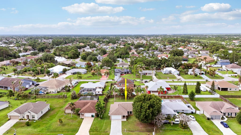 Photo of 1582 SW Aledo Lane, Port Saint Lucie, FL 34953 (MLS # B26037535)