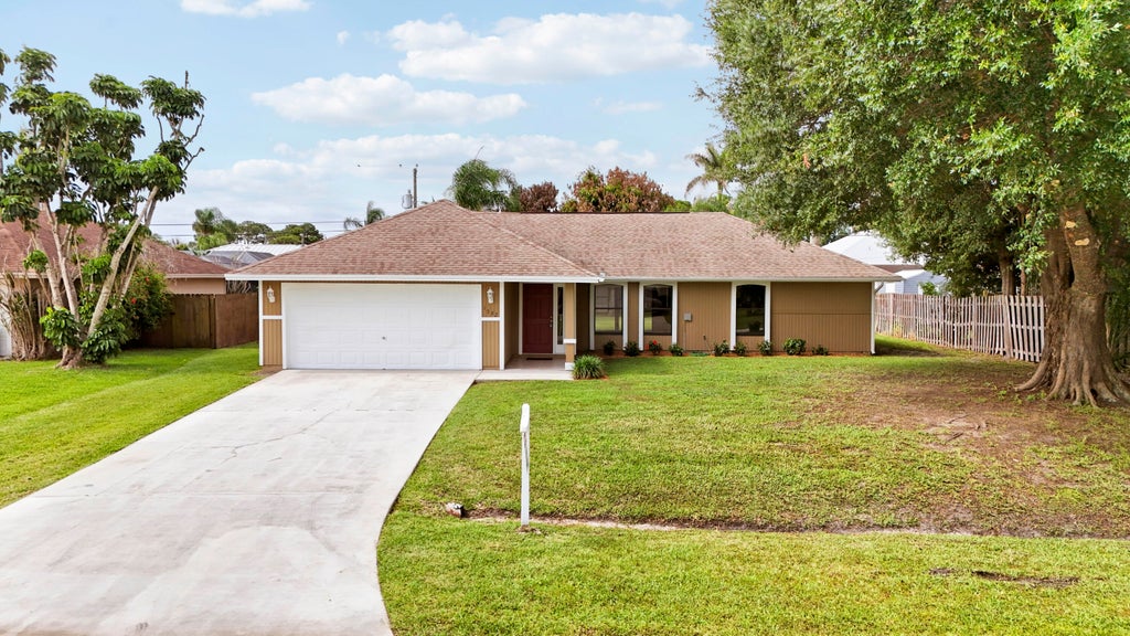 Photo of 1582 SW Aledo Lane, Port Saint Lucie, FL 34953 (MLS # B26037535)