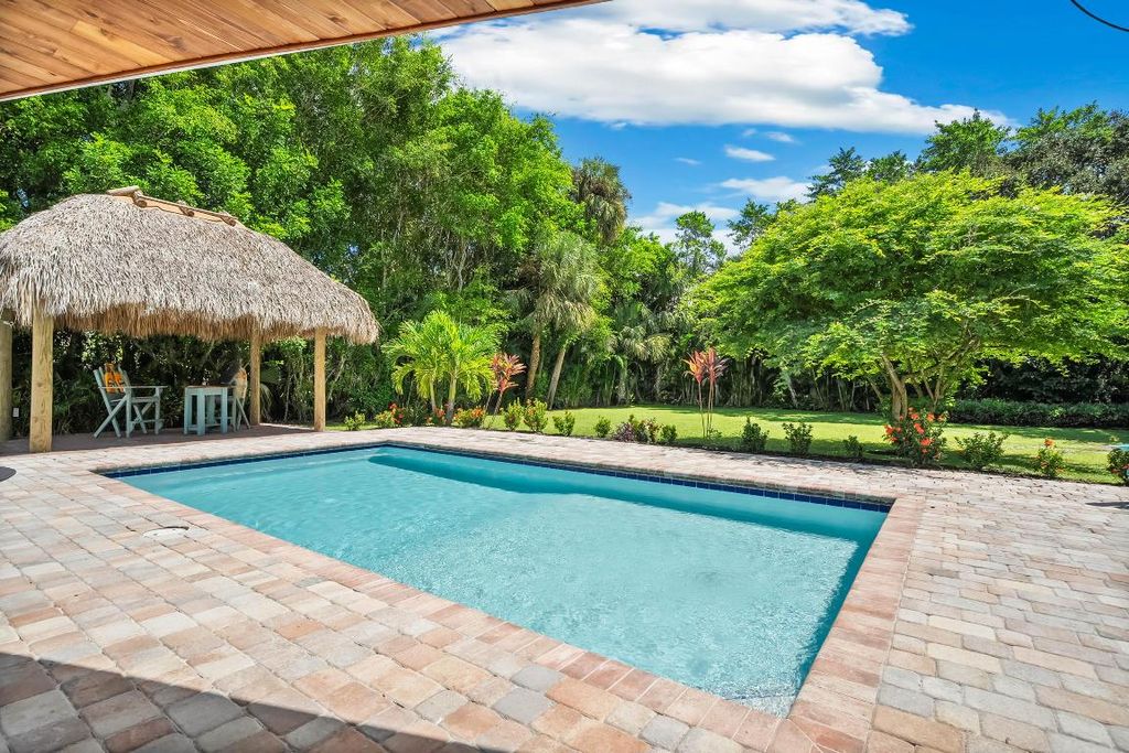 Photo of 3 Mandalay Road, Sewalls Point, FL 34996 (MLS # R11152090)