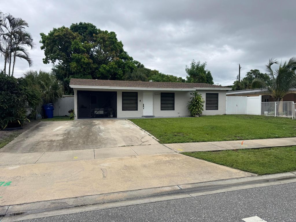 Photo of 1580 W 12th Street, Riviera Beach, FL 33404 (MLS # R11123648)