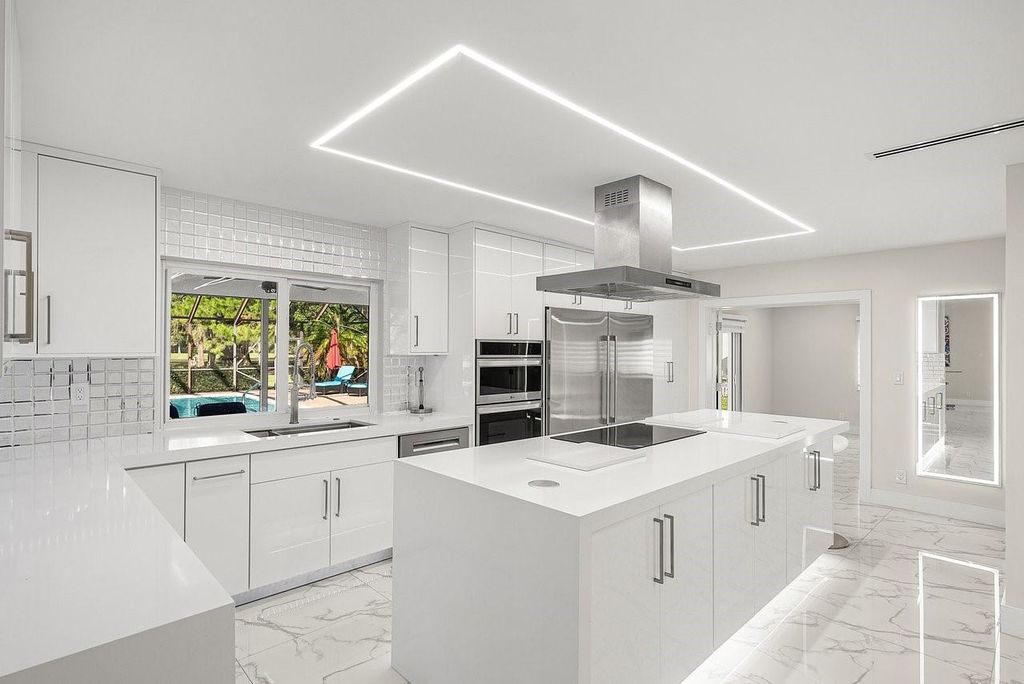 Photo of 10603 Boca Woods Lane, Boca Raton, FL 33428 (MLS # F10531439)