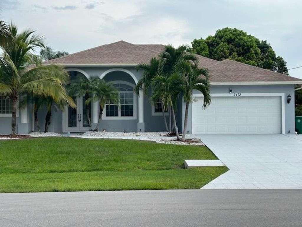 Photo of 2472 SW Valnera Street, Port Saint Lucie, FL 34953 (MLS # R10915053)