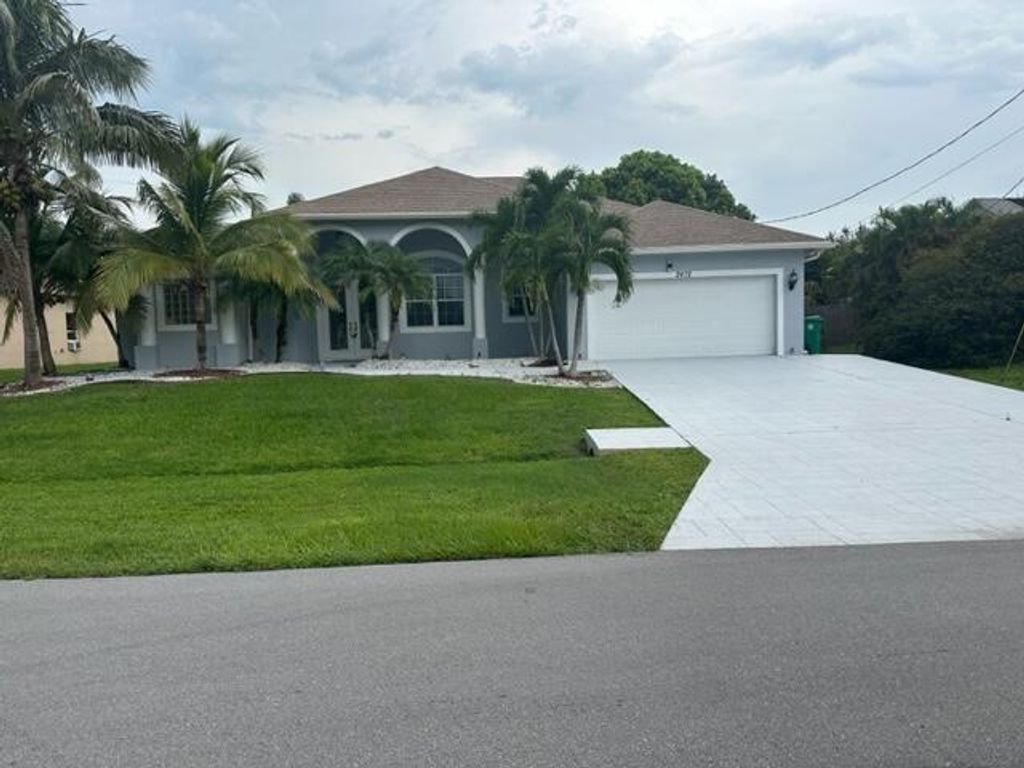 Photo of 2472 SW Valnera Street, Port Saint Lucie, FL 34953 (MLS # R10915053)
