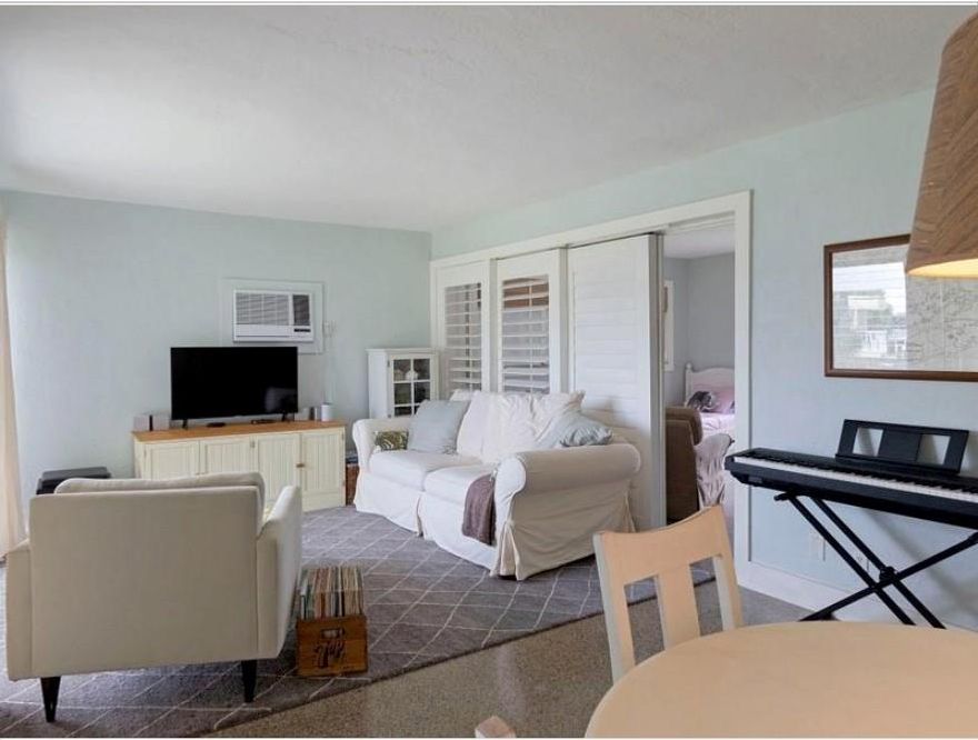 Lighthouse Point Marina area! This is THE perfect beachy condo! Corner, two bedrooms and two baths. Impact Windows and Doors! Pretty terrazzo and tile floors, with charming finishes throughout! Washer/Dryer IN unit. Enjoy the FULL corner unit effect of having a wrap around balcony for your private use! 2 parking spaces plus guest spaces. Great little village in LHP Marina and Nauti Dog restaurant area between the Intracoastal and Us1/Federal Hwy. The grounds are meticulously maintained and have lots of greenspace between the buildings, which sit in a circular compound surrounding the pool. Nestled among single family homes and waterfront inlets. Lots of outside spaces to walk, jog, bike! Small pets allowed. One week assoc approval for fast move-in!