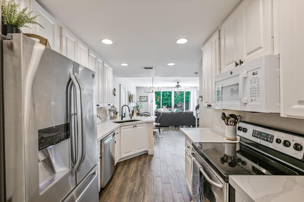 Photo of 187 Santa Barbara Way, Palm Beach Gardens, FL 33410 (MLS # R11140605)