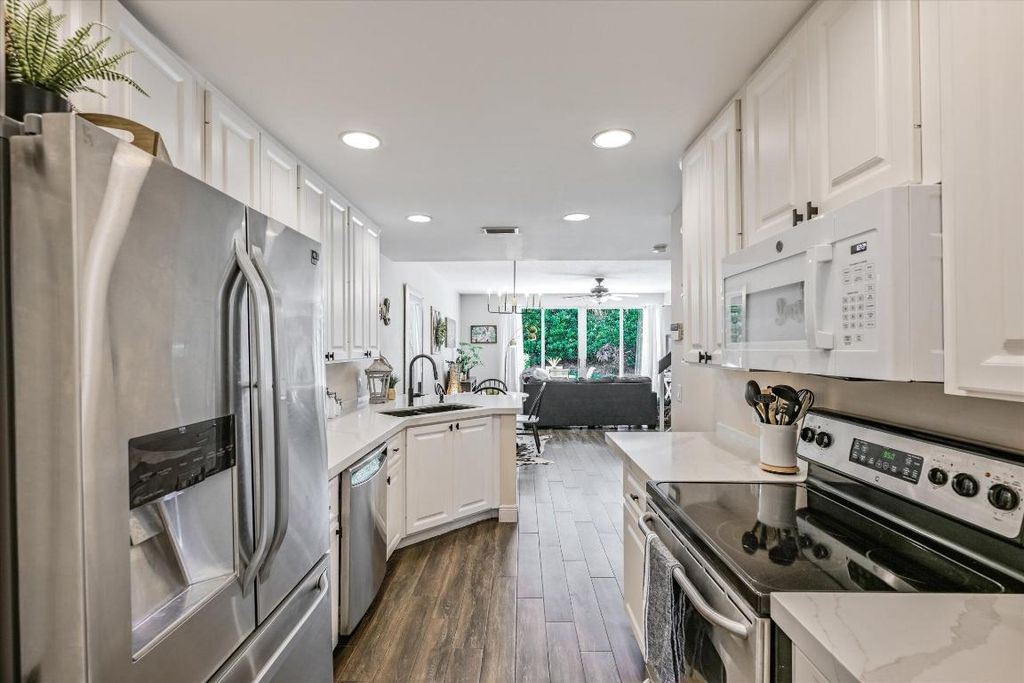 Photo of 187 Santa Barbara Way, Palm Beach Gardens, FL 33410 (MLS # R11140605)