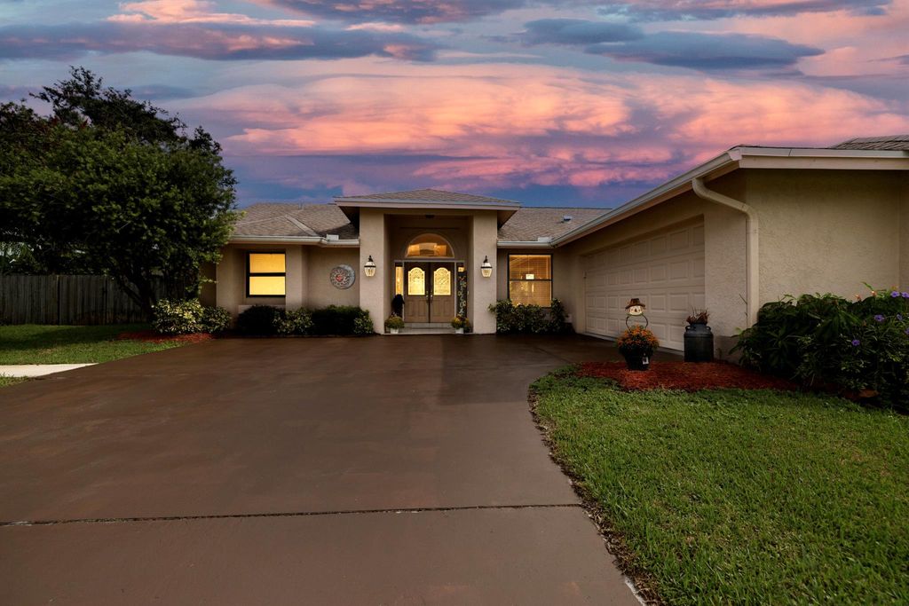 Photo of 715 SE Ablett Lane, Port Saint Lucie, FL 34984 (MLS # R10923061)