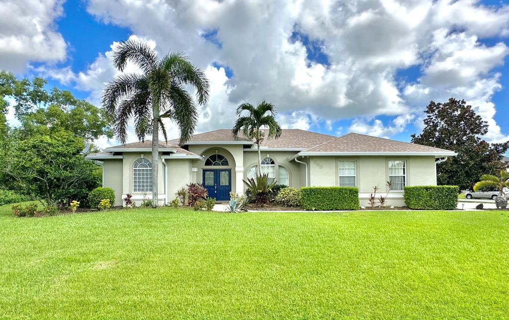 Photo of 5399 NW Lamoore Lane, Port Saint Lucie, FL 34983 (MLS # B26005592)