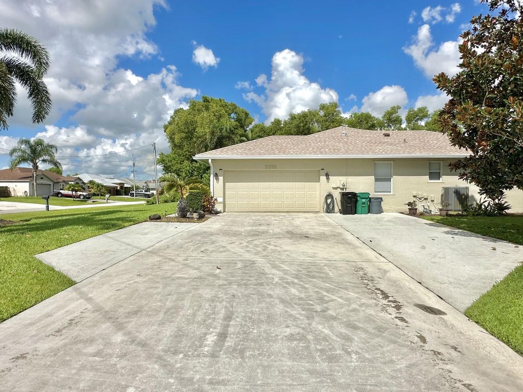 Photo of 5399 NW Lamoore Lane, Port Saint Lucie, FL 34983 (MLS # B26005592)