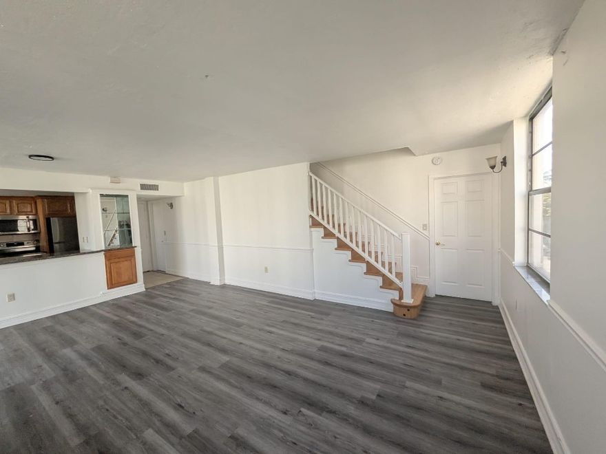 Turnkey Key Ready! Large two-story 3 bed/2.5 bath condo townhouse located on the second floor of a 3-story building in an all-age gated community. Nice and bright unit with updated appliances and bathrooms. The kitchen is opened up to a large living room area and dining room area. There is vinyl flooring throughout and a laundry/utility room with a full-size washer/dryer. Water, sewer and all insurance is included too!! PETS ARE NOT ALLOWED. NO RENTALS RESTRICCIONS! It can be rented the first day you own! Great Investment opportunity !!