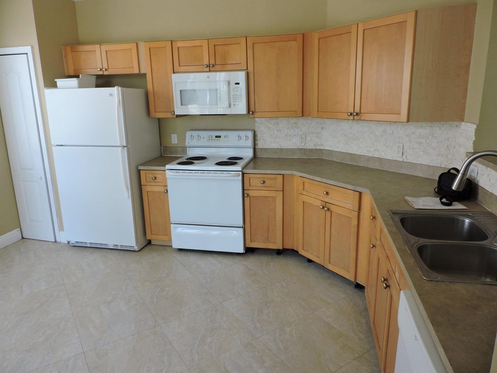 Photo of 11037 Legacy Boulevard #202, Palm Beach Gardens, FL 33410 (MLS # R11087269)