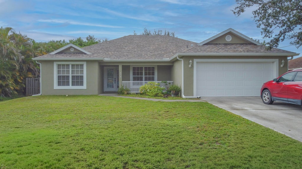 Photo of 679 SW Post Terrace, Port Saint Lucie, FL 34953 (MLS # R11124509)