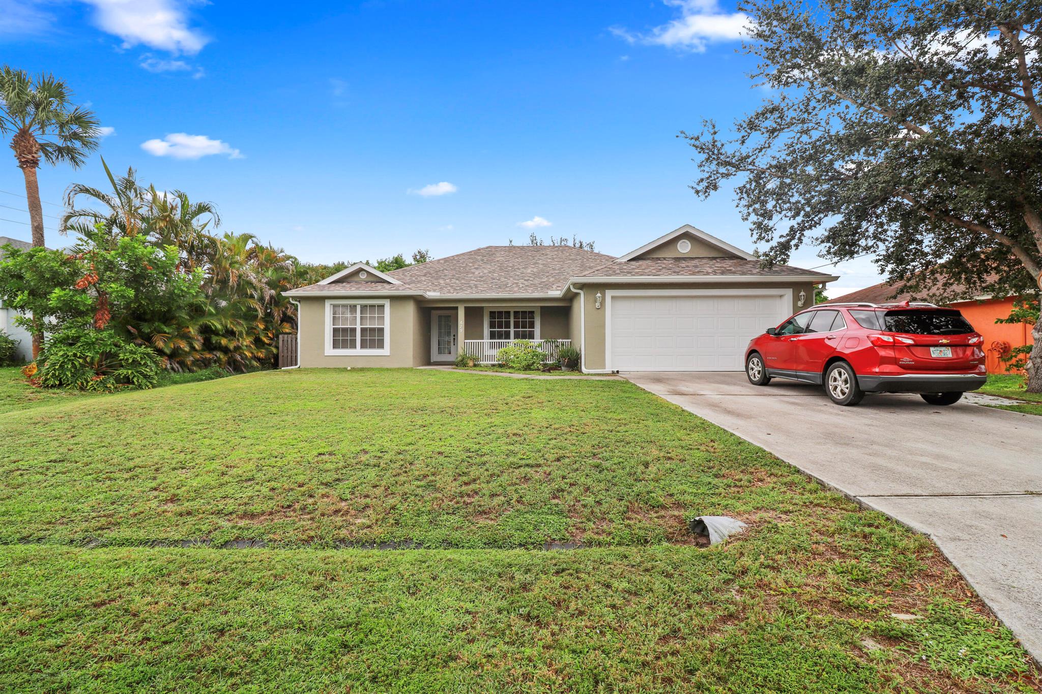 Looking for the perfect starter home or investment in the heart of Port St. Lucie? Look no further! This well-maintained home with great bones offers the perfect mix of comfort and convenience. Located close to shopping, dining, schools, and both I-95 and the Florida Turnpike, it's ideal for commuters and locals alike. With a 2024 roof, 4 year old AC, fully fenced yard, screened-in patio, and value-add opportunities, this property is ready for its next chapter.