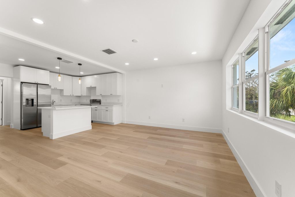 Photo of 111 W 35th Street, Riviera Beach, FL 33404 (MLS # B26014946)
