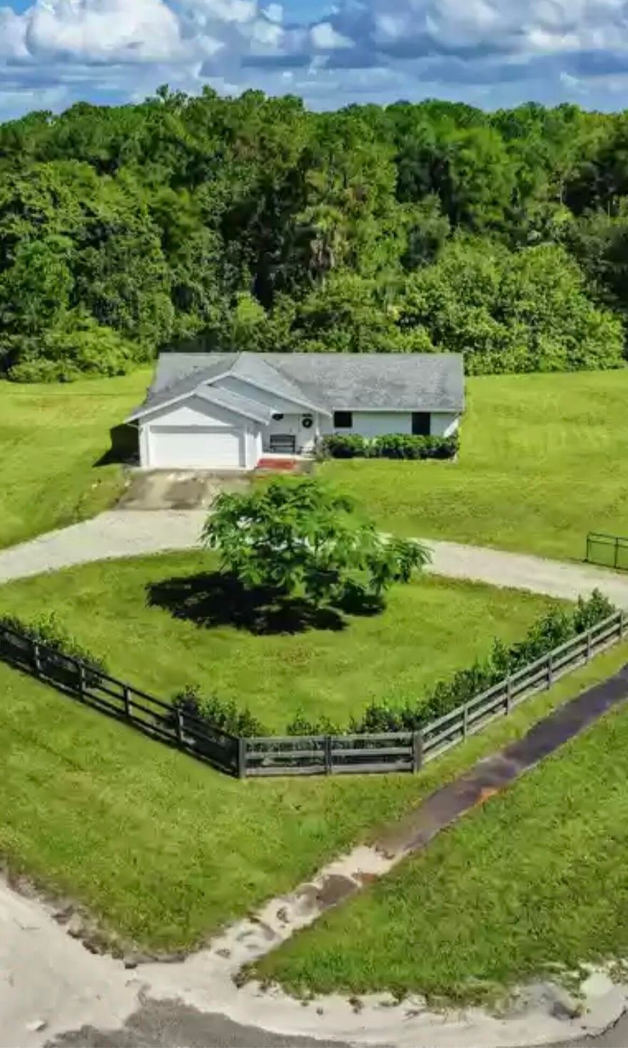 Stop paying HOA fees for a backyard you can't enjoy.
Welcome to your private 1.5-acre escape in Loxahatchee -- complete with a beautiful backyard pond, wide-open space, and a 2017 roof for peace of mind.
Bring your RV, boat, work trucks, chickens, or future pool plans -- there are no HOA restrictions here.
Imagine evenings by the water, morning coffee with quiet views, and room to build the lifestyle you've been wanting.
Located just minutes from Wellington and Royal Palm Beach, but far enough to enjoy true privacy.
This isn't just a home. It's freedom.