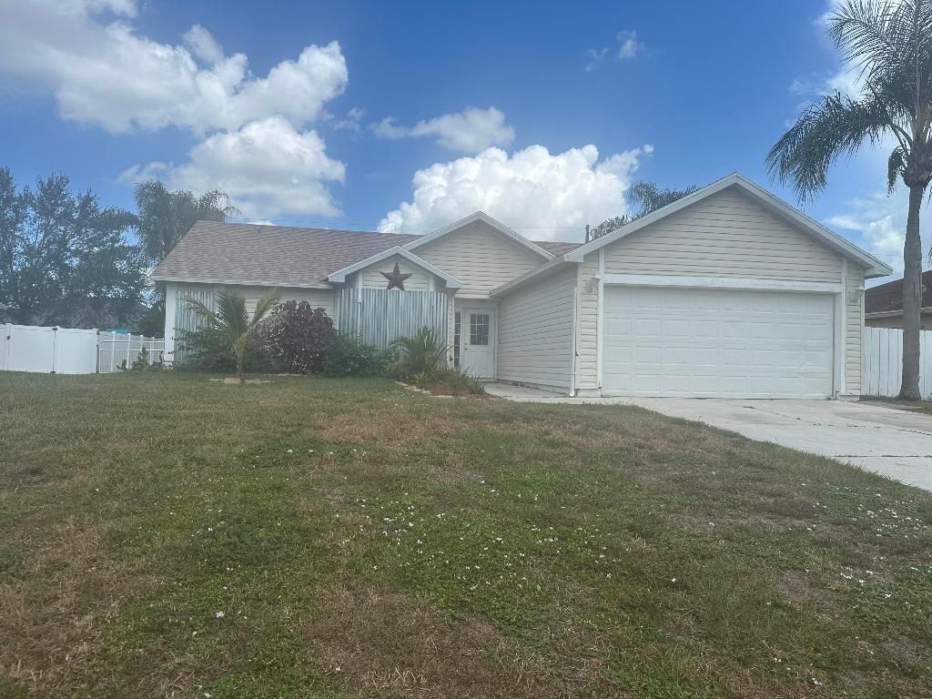 Photo of 379 SW Jeanne Avenue, Port Saint Lucie, FL 34953 (MLS # R11122478)