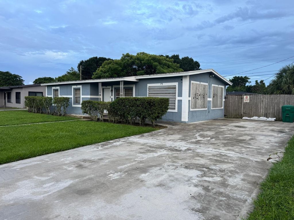 Photo of 3330 NW 7th Court, Lauderhill, FL 33311 (MLS # B26034888)