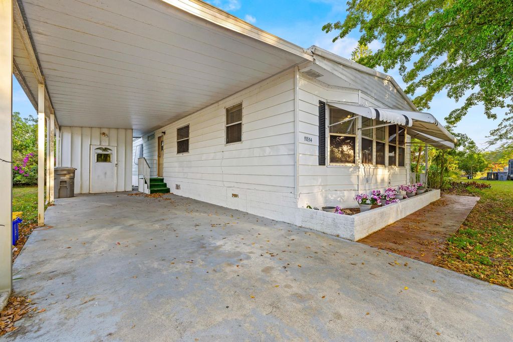 Photo of 11854 Cove Place, Boca Raton, FL 33428 (MLS # R11047942)