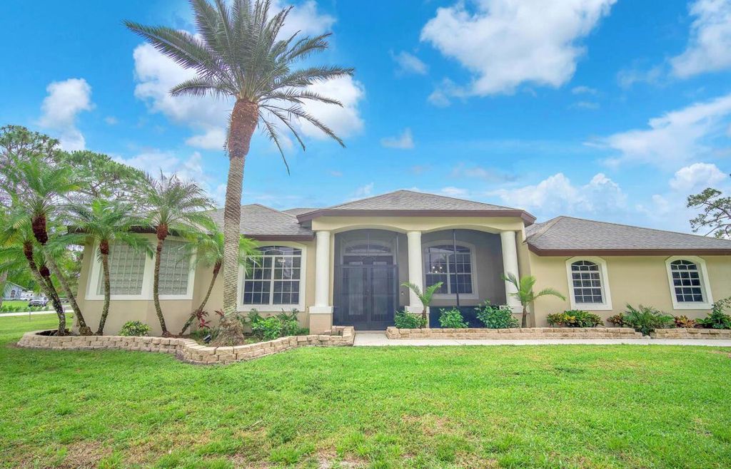 Photo of 12174 Persimmon Boulevard, The Acreage, FL 33411 (MLS # R10971933)