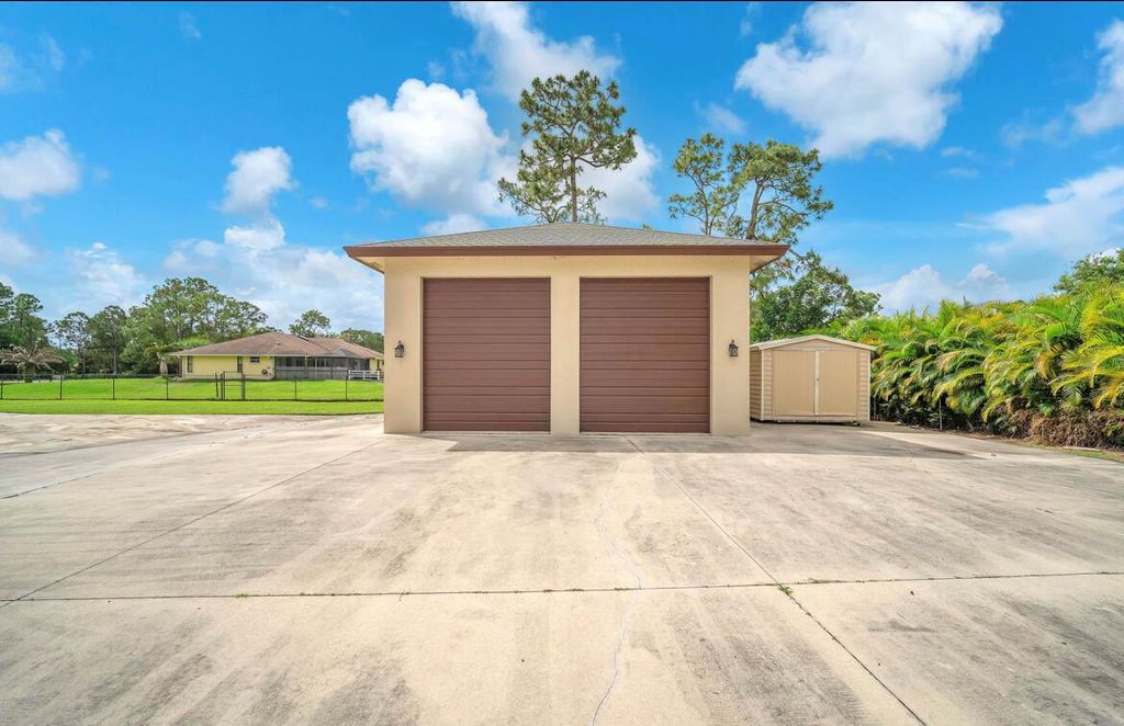 Photo of 12174 Persimmon Boulevard, The Acreage, FL 33411 (MLS # R10971933)