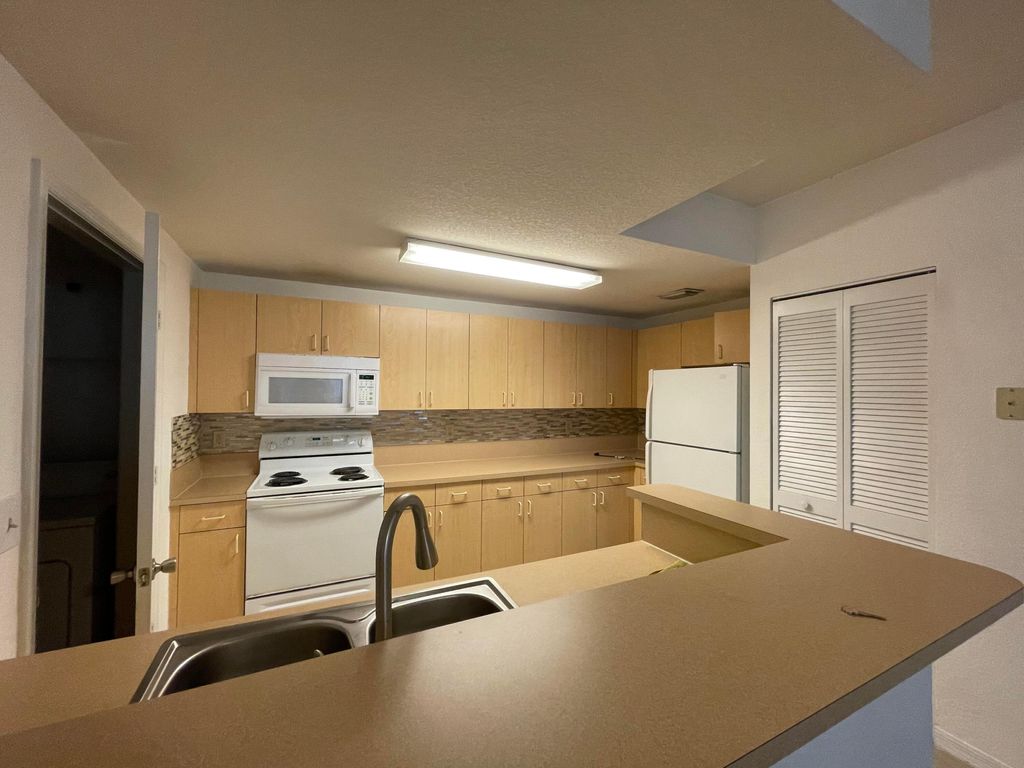 Photo of 170 SW Peacock Boulevard, Port Saint Lucie, FL 34986 (MLS # B26019336)