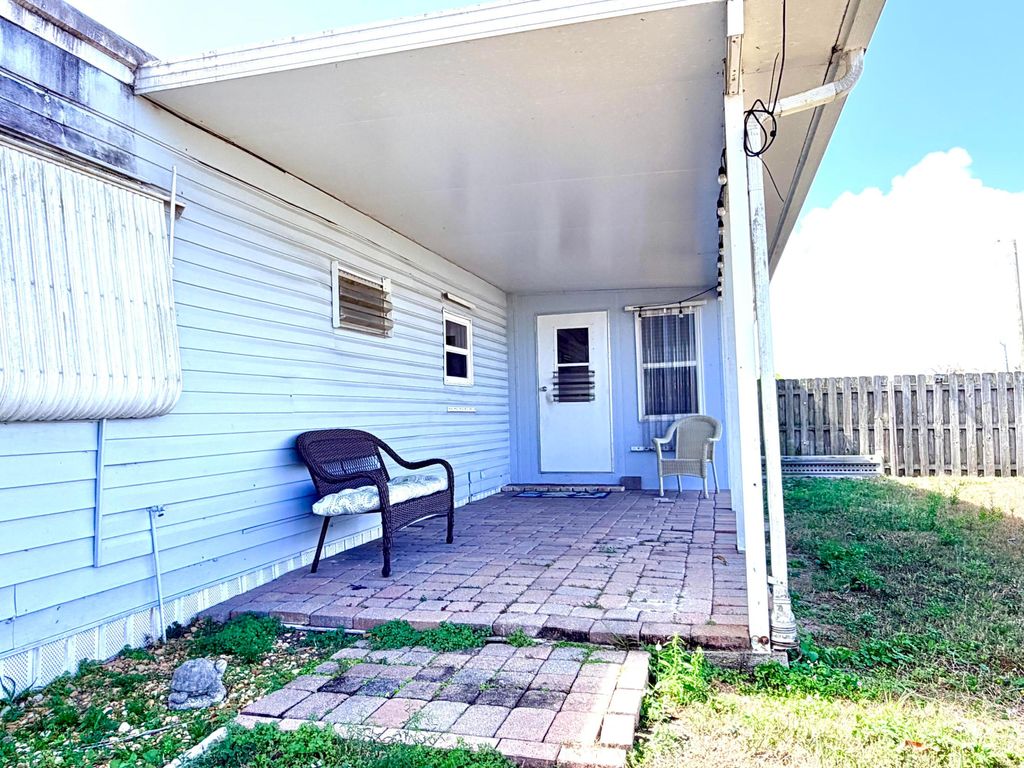 Photo of 8457 SE Swan Avenue, Hobe Sound, FL 33455 (MLS # B26002244)