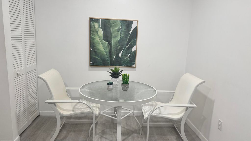 Photo of 5195 Europa Drive #H, Boynton Beach, FL 33437 (MLS # B26010016)