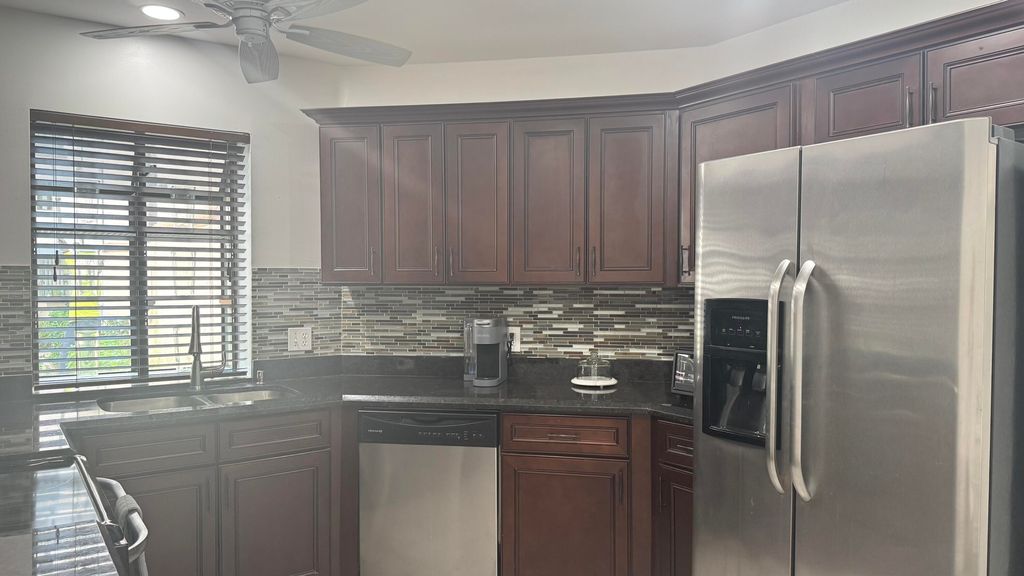 Photo of 5195 Europa Drive #H, Boynton Beach, FL 33437 (MLS # B26010016)