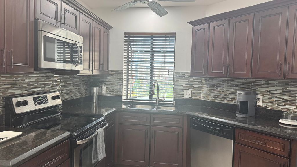 Photo of 5195 Europa Drive #H, Boynton Beach, FL 33437 (MLS # B26010016)