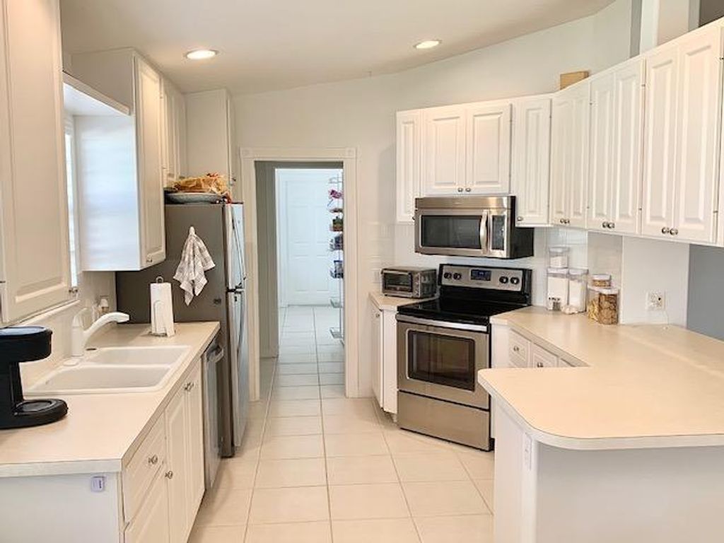 Photo of 10762 SW Elsinore Drive, Port Saint Lucie, FL 34987 (MLS # R11053764)