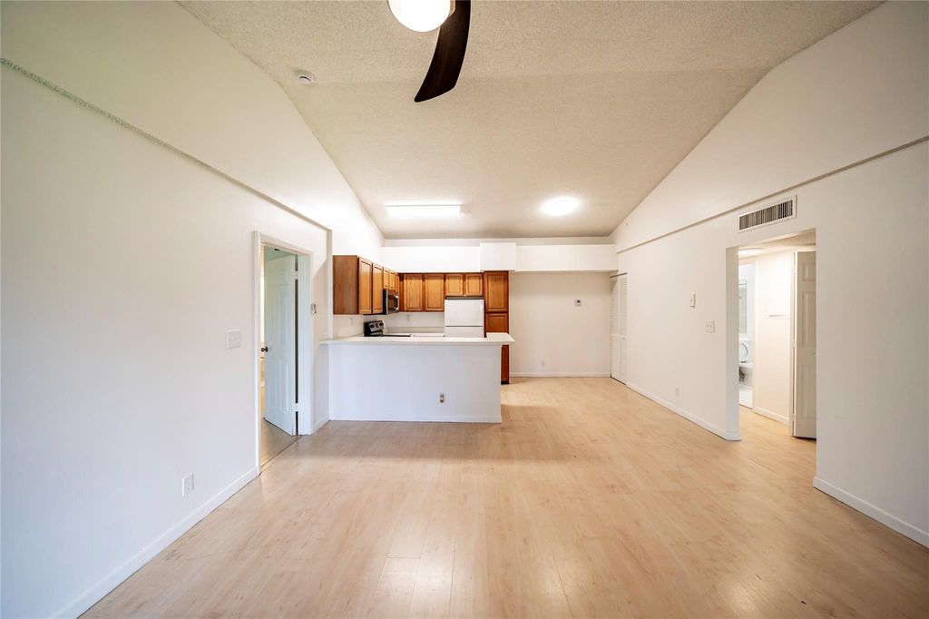 Photo of 721 Lyons Road #15-208, Coconut Creek, FL 33063 (MLS # F10529086)