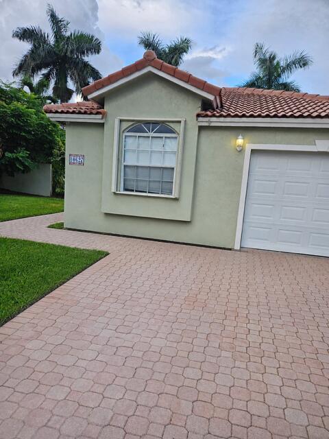 Photo of 10627 NW 7TH Street, Pembroke Pines, FL 33026 (MLS # B26070269)
